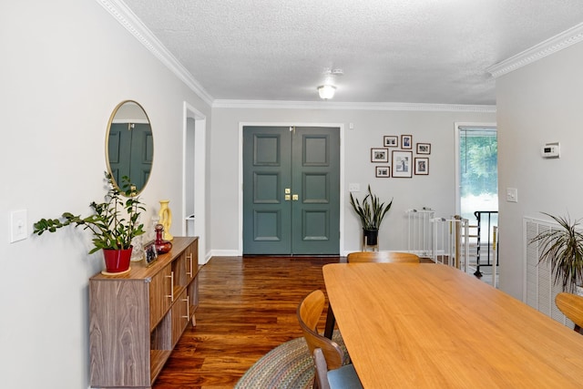 5024 Lakeridge Dr, Old Hickory, TN 37138 - dining room with dark wood-style flooring, ornamental molding, a textured ceiling, and baseboards