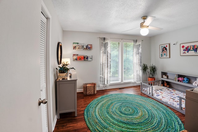 5024 Lakeridge Dr, Old Hickory, TN 37138 - sitting room with a textured ceiling, a ceiling fan, wood finished floors, and baseboards