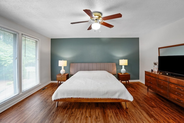 5024 Lakeridge Dr, Old Hickory, TN 37138 - bedroom featuring baseboards, wood finished floors, a textured ceiling, and ceiling fan