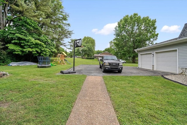 5024 Lakeridge Dr, Old Hickory, TN 37138 - view of grassy yard featuring a playground, a garage, and driveway
