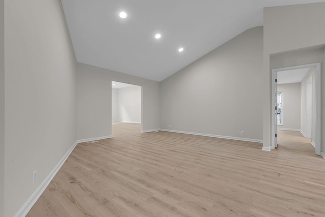 4048 Lancashire Dr, Antioch, TN 37013 - unfurnished living room with lofted ceiling, light wood finished floors, baseboards, and recessed lighting
