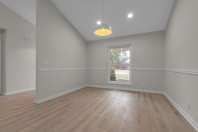 4048 Lancashire Dr, Antioch, TN 37013 - unfurnished room with light wood-type flooring, lofted ceiling, and baseboards