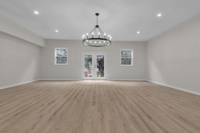 4048 Lancashire Dr, Antioch, TN 37013 - spare room featuring healthy amount of natural light, a chandelier, light wood finished floors, baseboards, and recessed lighting