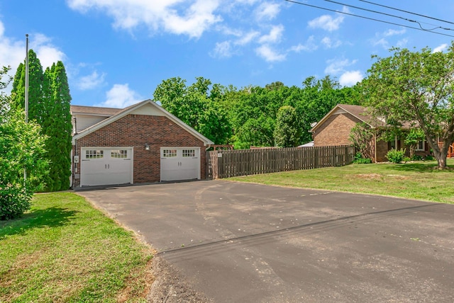 view of side of home with brick siding and driveway