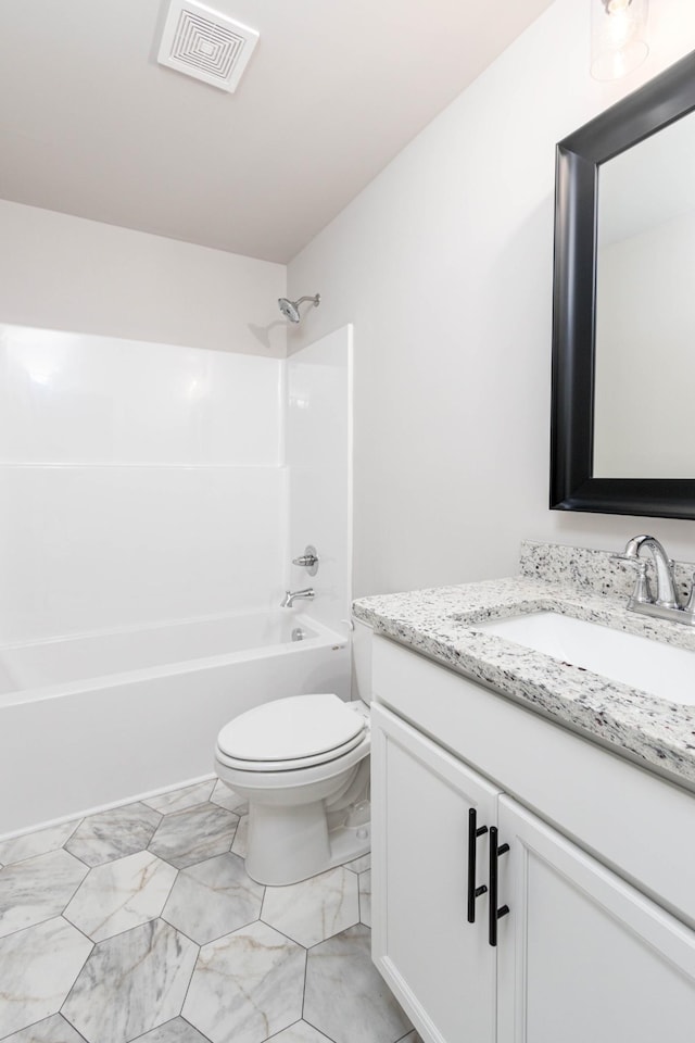 bathroom with toilet, visible vents,  shower combination, and vanity