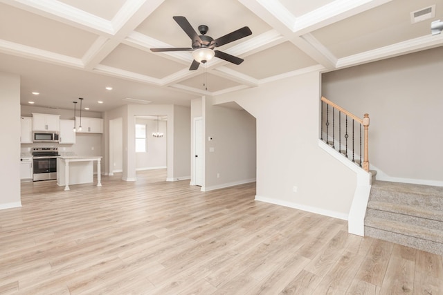 unfurnished living room with a ceiling fan, coffered ceiling, visible vents, light wood-style floors, and recessed lighting
