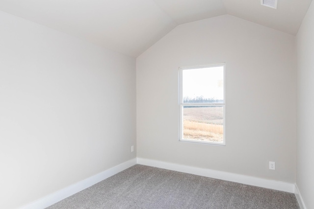 bonus room featuring visible vents, baseboards, lofted ceiling, and carpet floors