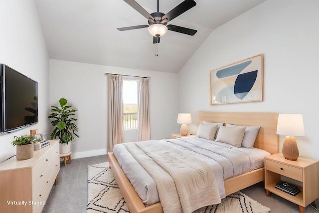 bedroom featuring carpet flooring, a ceiling fan, baseboards, and lofted ceiling