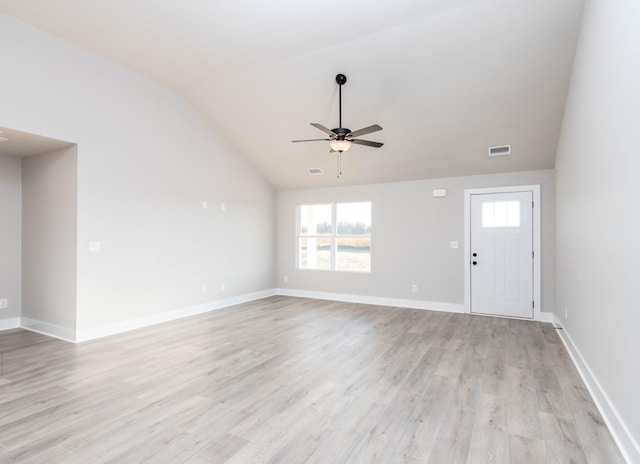 unfurnished living room featuring visible vents, vaulted ceiling, ceiling fan, baseboards, and light wood-style floors