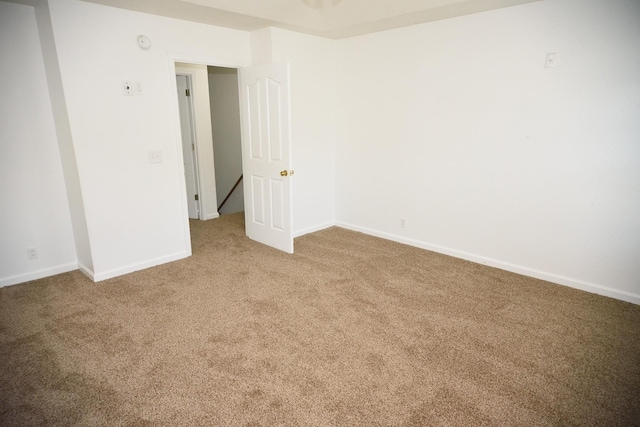 301 Arapaho Dr, Murfreesboro, TN 37128 - carpeted empty room featuring baseboards and a smoke detector
