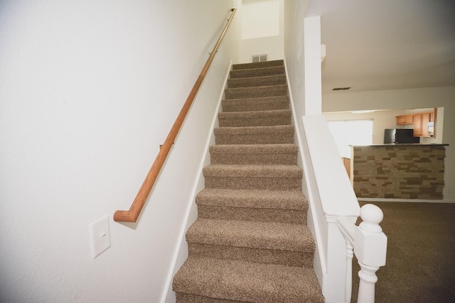 301 Arapaho Dr, Murfreesboro, TN 37128 - staircase featuring carpet