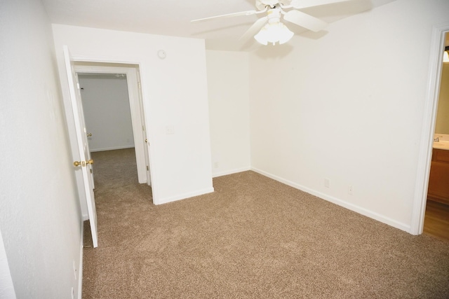 301 Arapaho Dr, Murfreesboro, TN 37128 - unfurnished bedroom with carpet, baseboards, ensuite bathroom, and a ceiling fan