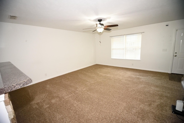 301 Arapaho Dr, Murfreesboro, TN 37128 - unfurnished living room featuring ceiling fan, carpet floors, and baseboards