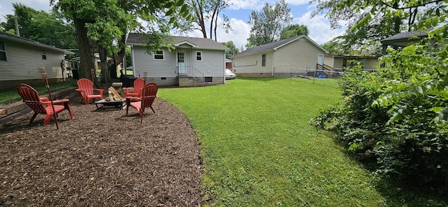 429 E Castle St, Murfreesboro, TN 37130 - view of yard with entry steps, a fire pit, and fence