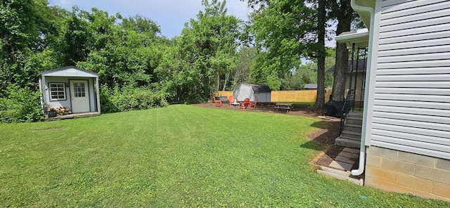 429 E Castle St, Murfreesboro, TN 37130 - view of yard featuring a shed, an outdoor structure, and fence