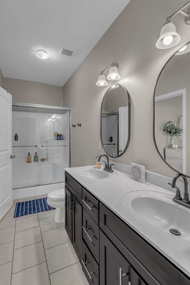 1803 Villa Cir, Lebanon, TN 37090 - bathroom featuring a sink, tile patterned flooring, double vanity, and visible vents
