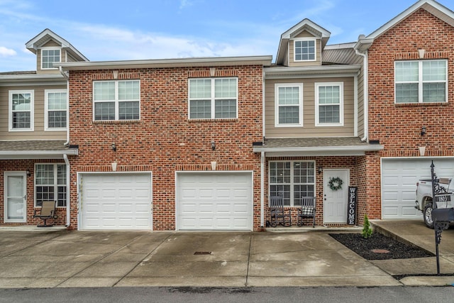 1803 Villa Cir, Lebanon, TN 37090 - multi unit property with driveway, brick siding, and an attached garage