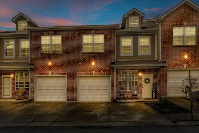 1803 Villa Cir, Lebanon, TN 37090 - multi unit property featuring an attached garage, brick siding, and driveway
