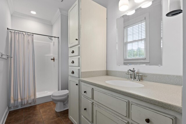 full bathroom featuring toilet, vanity, crown molding, tile patterned flooring, and a shower with shower curtain