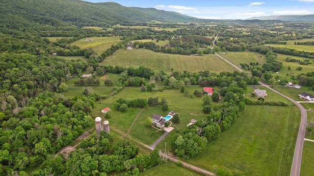 bird's eye view featuring a rural view and a mountain view