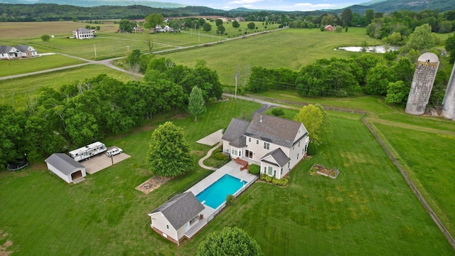 birds eye view of property featuring a rural view