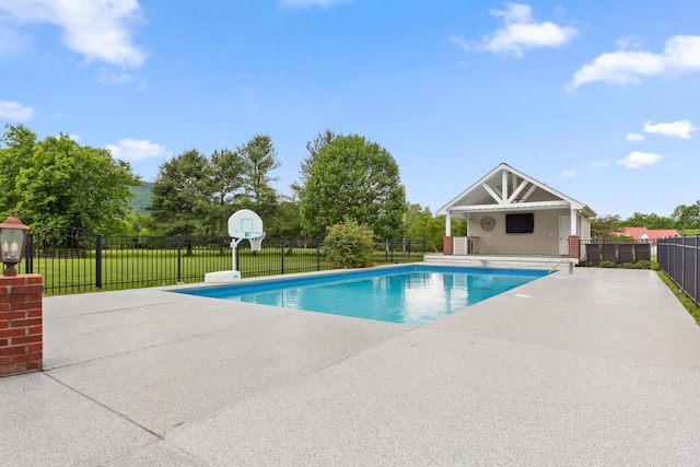 view of pool with a yard, a patio, a fenced in pool, and fence