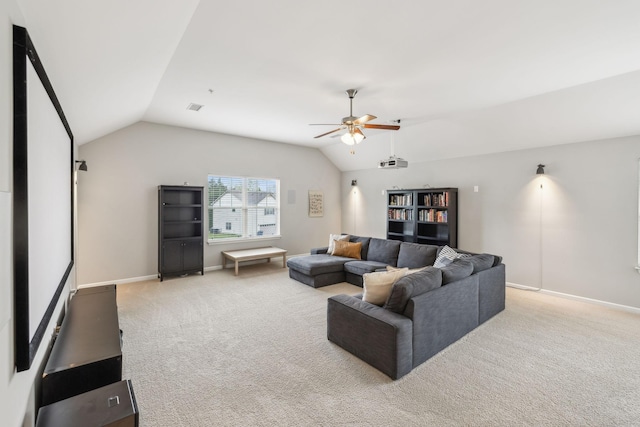 living room featuring lofted ceiling, visible vents, ceiling fan, light carpet, and baseboards