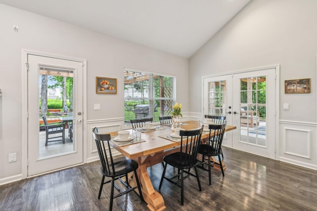dining space with a decorative wall, french doors, and plenty of natural light