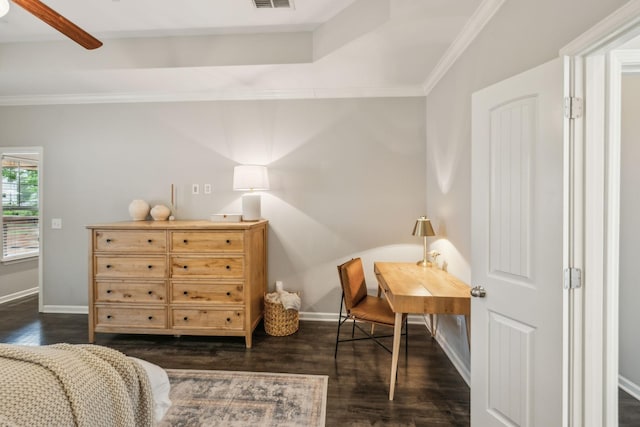 bedroom featuring baseboards, dark wood-style flooring, visible vents, and crown molding