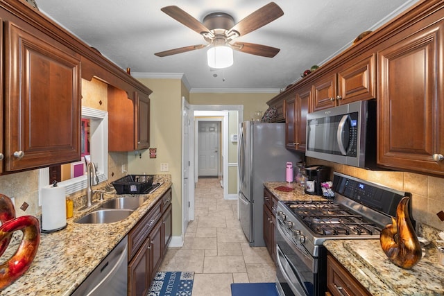 4006 Greentree Ct W, Smyrna, TN 37167 - kitchen featuring stainless steel appliances, a sink, decorative backsplash, baseboards, and ceiling fan