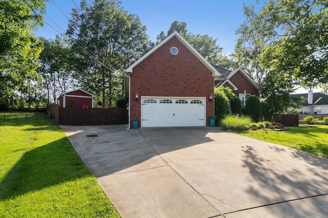 4006 Greentree Ct W, Smyrna, TN 37167 - view of side of home with brick siding, driveway, and a garage