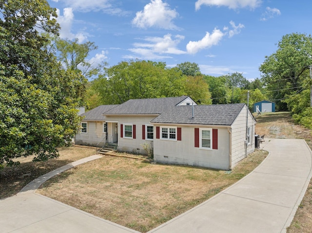 1011 Cornersville Rd, Lewisburg, TN 37091 - view of front facade featuring a front lawn, roof with shingles, a chimney, and crawl space