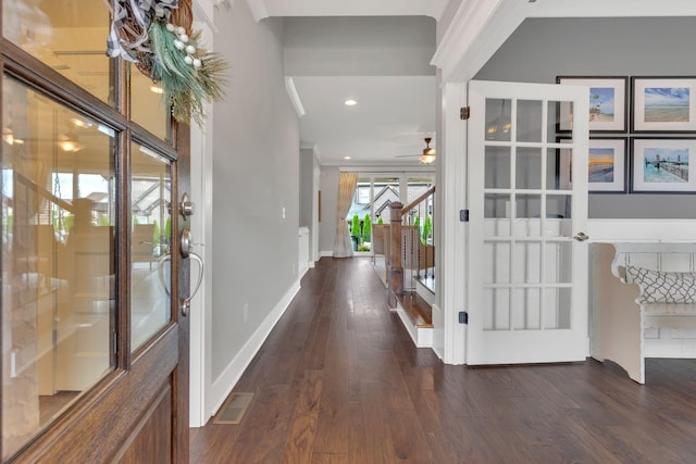 foyer entrance featuring a ceiling fan, dark wood finished floors, visible vents, baseboards, and recessed lighting