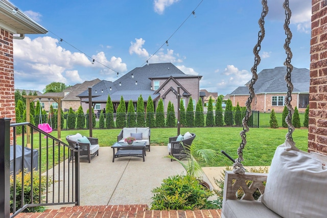 view of patio with a fenced backyard, an outdoor living space, and a residential view