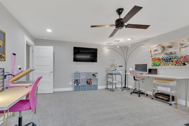 carpeted office space with ceiling fan, baseboards, and recessed lighting