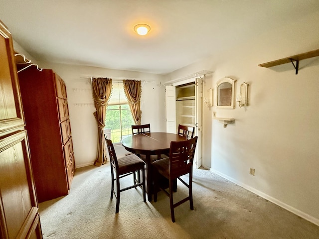 1165 Main St, Lynchburg, TN 37352 - dining area featuring light colored carpet and baseboards