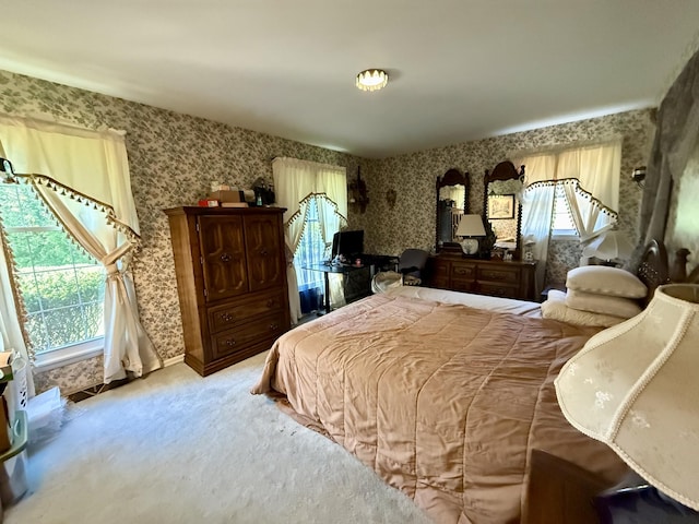 1165 Main St, Lynchburg, TN 37352 - bedroom featuring wallpapered walls, multiple windows, carpet floors, and baseboards