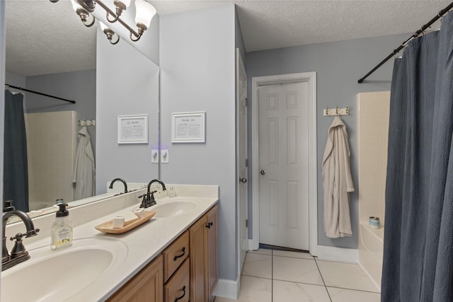 full bath featuring a textured ceiling, shower / tub combo, and a sink
