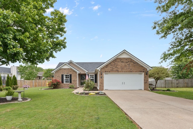 ranch-style house with a garage, fence, a front yard, brick siding, and driveway