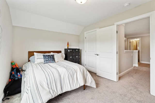 bedroom featuring carpet and baseboards
