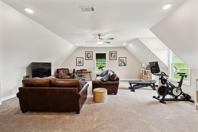interior space featuring vaulted ceiling, visible vents, and recessed lighting
