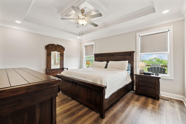 bedroom featuring visible vents, a raised ceiling, ornamental molding, and recessed lighting