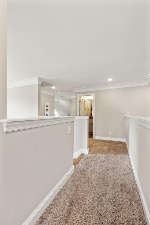 carpeted empty room featuring ornamental molding, baseboards, and recessed lighting