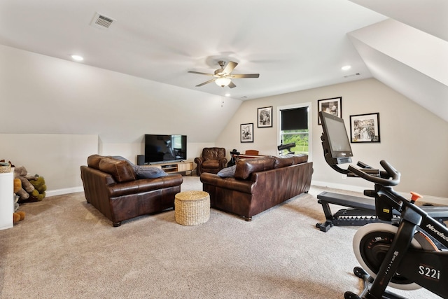 living room featuring a ceiling fan, lofted ceiling, visible vents, and carpet floors