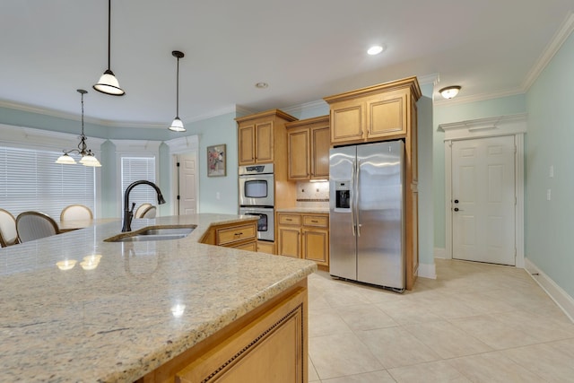 2808 Wynthrope Hall Dr N, Murfreesboro, TN 37129 - kitchen with crown molding, appliances with stainless steel finishes, light stone counters, and a sink