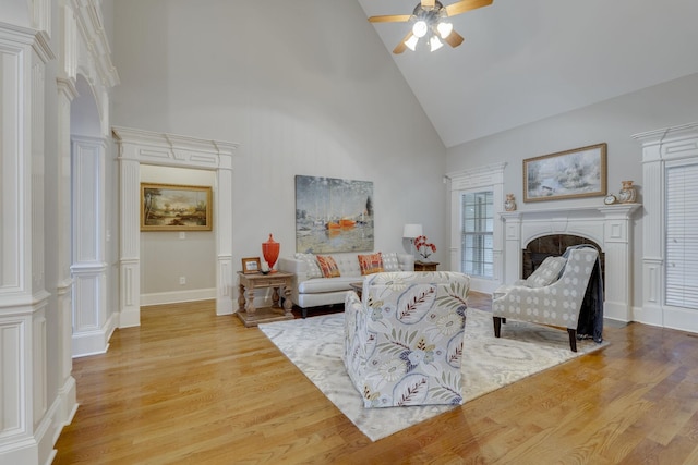 2808 Wynthrope Hall Dr N, Murfreesboro, TN 37129 - living area featuring ceiling fan, light wood-style floors, a fireplace, and high vaulted ceiling