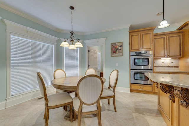 2808 Wynthrope Hall Dr N, Murfreesboro, TN 37129 - dining space with baseboards, ornamental molding, an inviting chandelier, and light tile patterned floors