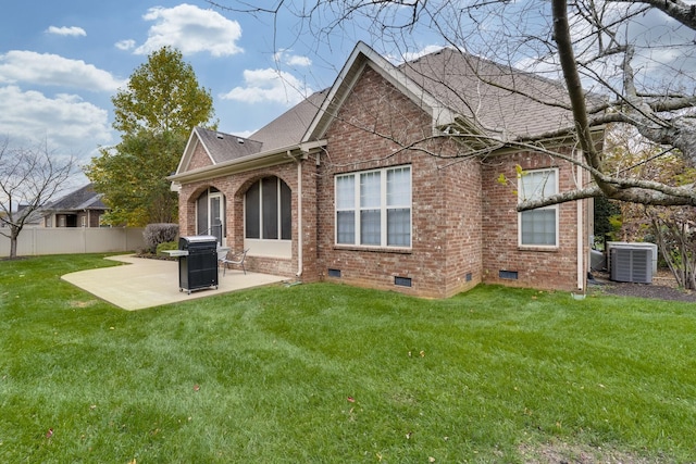 2808 Wynthrope Hall Dr N, Murfreesboro, TN 37129 - back of house featuring central air condition unit, roof with shingles, a patio area, and brick siding
