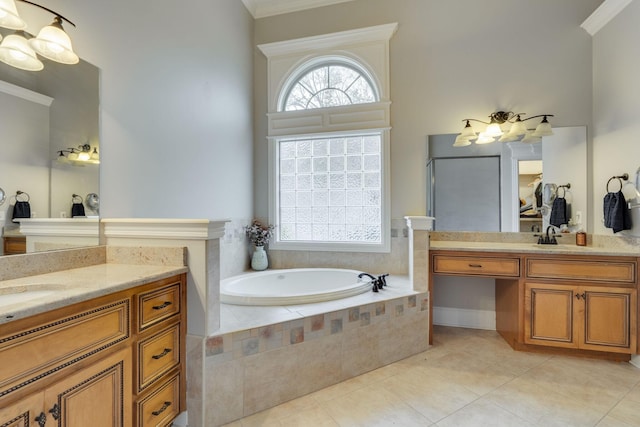 2808 Wynthrope Hall Dr N, Murfreesboro, TN 37129 - bathroom featuring ornamental molding, a sink, a bath, tile patterned flooring, and two vanities