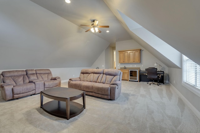 2808 Wynthrope Hall Dr N, Murfreesboro, TN 37129 - living room with beverage cooler, baseboards, light carpet, lofted ceiling, and recessed lighting